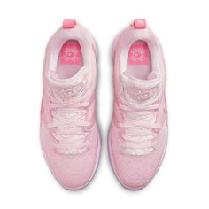 Nike proudly presents their newest release from the KD 15 collection, the Aunt Pearl EP Pink edition. Built for performance and style, this sneaker pays tribute to one of the most enduring influences in Kevin Durant’s life - his late Aunt Pearl. Featuring a combination of mesh, suede, ribbed TPU materials, and a floral print atop the upper, these kicks stand out. The crushed velvet tongues feature special KD patches while ‘Aunt Pearl’ writing adorns the right pull tab- a charming reminder of her bond with her nephew. Quality is found within every element as seen with full-length Cushlon midsoles and visible Air Zoom Strobel units which ensure comfort and support during each step and jump. Own your own pair today to combine exclusive design, enough cushioning for all occasions, all while ho Basketball Shoes Aesthetic, Colorful Volleyball Shoes, Way Of Wade Shoes, Aunt Pearls, Cool Basketball Shoes, Vball Shoes, Basketball Shoes Women's, Nike Kd 15