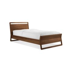 the bed frame is made from wood and has a white sheet on top of it