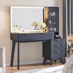 a dressing table with a mirror and flowers on it