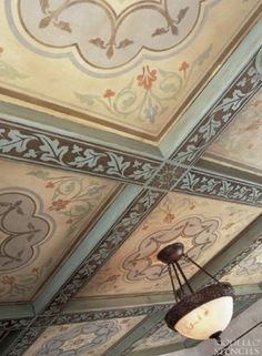 the ceiling is decorated with intricate designs