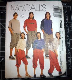 an old pattern for children's sweatpants and pants, with the image of young men in different outfits