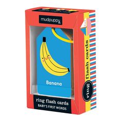 a card game in a box with a banana on the front and blue back side