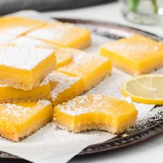 several pieces of lemon cake on a white plate