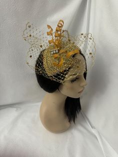 Absolutely beautiful! This is a couture and elegant unique cut design OOAK (one of a kind) vintage 1920 flapper styled pearl beaded with rhinestone jeweled half hat fascinator with metallic gold dotted veil    perfect for weddings, Mother of the Bride hat, Bridal fascinator hat, Church hats, COGIC women convention hats, tea parties, cocktail parties  and special occasion headpiece. Looking for a unique handmade fashion lover gift for women, then this is a perfect gift.  E A S Y  T O  W E A R  Fo Handmade Gold Hat For Kentucky Derby, Fitted Gold Carnival Costume Hat, Fitted Gold Costume Hat For Carnival, Party Crown Headpiece With Beads, Fitted Wedding Fascinator For Carnival, Elegant Wedding Fascinator For Carnival, Elegant Mini Hats For Wedding And Carnival, Elegant Bead Cap Headband, Gold Gatsby Style Formal Headpieces