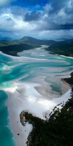 an aerial view of the white sand beach and lagoons in the tropical island area