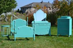 three pieces of furniture sitting in the grass