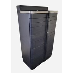 a large black plastic storage container with metal trimming on the top and bottom sides