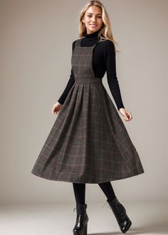 Keep your fashion game strong in our Plaid Wool Midi Dress or the equally stunning Wool Pinafore Dress. Level up your fashion quotient with our Pleated Dress or express your individuality through our Fit and Flare Wool dress. ★★FEATURES * 25% wool, other fiber,nylon * Polyester lining * Two side seam pockets * Right hidden zipper closure * Adjustable strap * Plaid Wool Dress * Wool Pinafore Dress * Fit and flare dress * Perfect for winter, autumn, spring * Dry clean ★★ Bespoke Order Service If you Request other color Request the length Your height is not between 155 cm- 172 cm Your weight is over 75 kg I can do it for you, It will need some extra fee depending on on your need. Contact with me for more detail. ★★ Get your size in Size Chart with your body measurement https://www.etsy.com/li Wool Jumper Dress, Knee-length Fitted Pinafore Dress For Fall, Fitted Knee-length Pinafore Dress For Fall, Vintage Plaid Dress For Winter, Vintage Plaid Winter Dress, Vintage Sleeveless Pinafore Dress For Fall, Plaid Pinafore Dress, Dark Academia Pinafore, Wool Pinafore