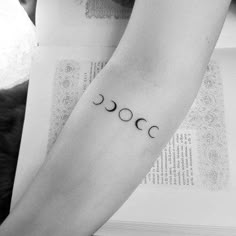 a person with a tattoo on their arm that reads,'oooh '