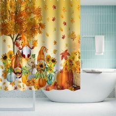 the shower curtain is decorated with autumn scenes