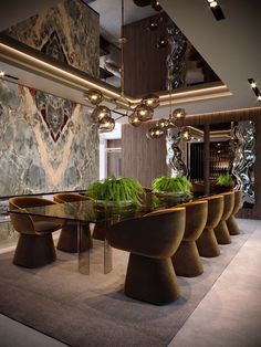 an elegant dining room with marble walls and flooring