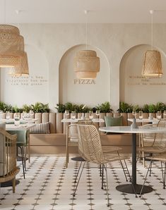 the interior of a restaurant with tables and chairs