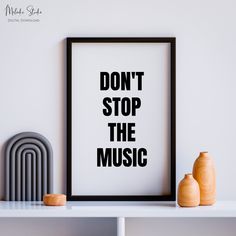 a black and white poster that says don't stop the music