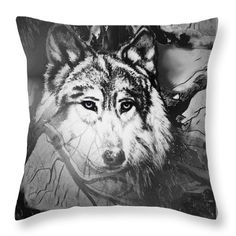 a wolf throw pillow with an artistic background