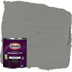 a can of paint that is green with the words glidden on it