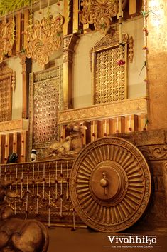 an intricately decorated room with gold and white decorations