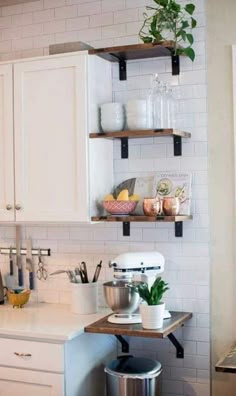 the kitchen is clean and ready to be used as a potting station for plants