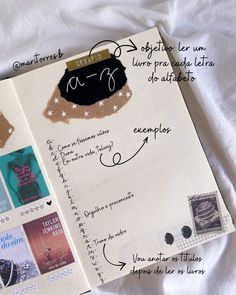 an open notebook with writing and pictures on it