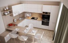 an aerial view of a kitchen and dining area with white chairs, counter tops, cabinets, and shelves