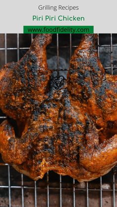 a close up of a chicken on a grill