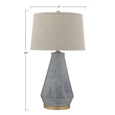 an image of a table lamp with measurements for the base and fabric shade on it