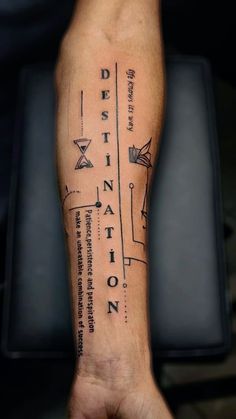 a person's arm with a tattoo on it that reads destination and has an arrow in the middle