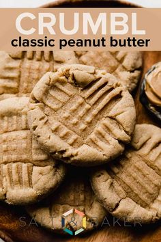 peanut butter crumbl cookies on a wooden plate with text overlay that reads, crumbl classic peanut butter