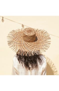 You'll look vacation-ready in this wide-brimmed sun hat crafted from multicolored palm straw. Palm straw Spot clean Made in the USA of imported materials Spring Beachwear Sun Hat In Natural Color, Natural Color Beachwear Sun Hat For Spring, Natural Color Spring Beachwear Sun Hat, Natural Spring Beachwear Sun Hat, Palm Leaf Sun Hat For Beach In Spring, Woven Hats For Beach Vacation, Spring Beachwear Toquilla Straw Hat, Casual Palm Leaf Sun Hat For Beach Season, Summer Beachwear Sun Hat In Toquilla Straw