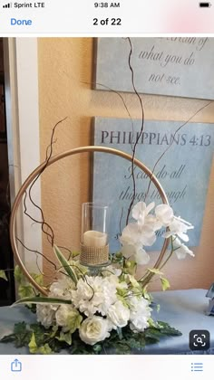 a vase filled with white flowers on top of a table