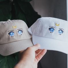 Sailor Moon Embroidered Hat A great gift or piece for everyday wear. Direct embroidery, only available here at Embroidered Dad Hats! 🧢• Embroidered on a cotton dad hat.• Adjusts up to 24" in circumference.• Unstructured and low profile fit.• Free poly-bag shipping in 🇺🇸 (more options at checkout). 90s Anime Eyes, Embroidered Hat, 90s Anime, Embroidered Hats, Anime Eyes, Poly Bags, Dallas Texas, Dad Hat, Small Shop