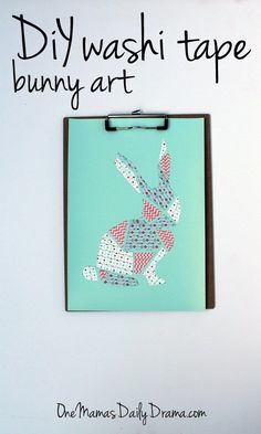 a clipboard with a drawing of a rabbit on it