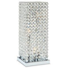 a crystal table lamp on a white background