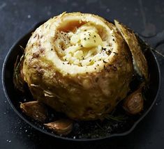 an image of a baked item on a plate with the words, so nice herb - baked celeriac