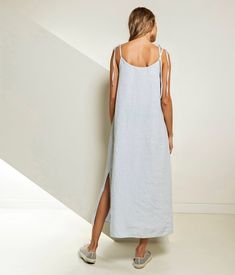 "Light summer slip dress, cami-dress from linen. Fluttering A-line silhouette and elegant front pleat turn this simply minimalistic dress into the the playful outfit. Emphasize your mood and style by selecting from 40 colours palette. Nothing welcomes the warmer months quite as well as a linen dress. It's a must-have for your hot summer. Double washed for extra softness and shrinkage prevention. Double washed for extra softness and shrinkage prevention. ABOUT US LINEN ID was born from desire to Casual Linen Maxi Sundress, Summer Loungewear Maxi Dress, Linen Sundress For Daywear, Linen Sundress With Adjustable Straps For Summer, Linen Sundress Maxi Dress For Daywear, Summer Midi Dress With Side Slits For Loungewear, Linen Sundress With Adjustable Straps, Summer Linen Dress With Adjustable Straps For Daywear, Casual Linen Maxi Dress For Loungewear