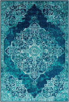 a blue rug with an ornate design on the top and bottom, in shades of teal