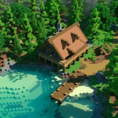 an aerial view of a house in the middle of a lake surrounded by trees and rocks