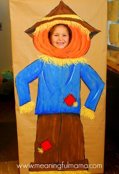 a child's art project made out of construction paper with a scarecrow on it