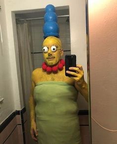 a person in a costume taking a selfie