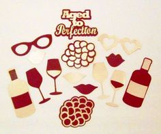 paper cutouts with wine glasses, bottles and hearts