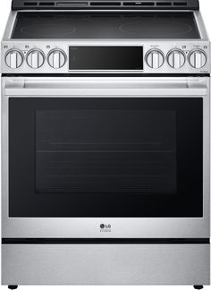 a stainless steel stove with the oven door open and an electronic timer on it's side