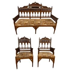 four pieces of furniture are arranged in the shape of an ornate bench and two chairs