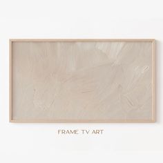 the frame tv art is hanging on the wall with gold lettering that reads frame tv art