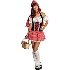 a woman in a red and white costume holding a basket