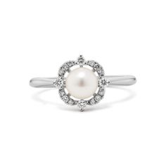 Elegant White Cluster Ring With Halo Design, Formal Diamond Pearl Ring With Halo Design, Elegant Pearl Ring With Halo Design For Wedding, Classic Pearl Ring With Halo Setting, White Pearl Halo Ring For Anniversary, Elegant Pearl Ring With Halo For Wedding, Formal Pearl Ring With Halo Design, Classic Pearl Ring With Halo Design, Anniversary Pearl Ring With Halo Design