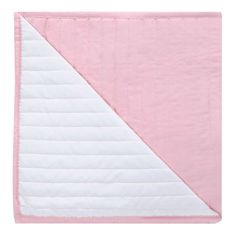 a pink and white quilted blanket with two diagonals on the bottom, one side