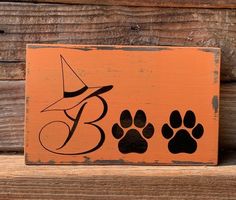 Halloween Fall Decorations wood sign that says Boo.  Pet themed. Dog Paw Print Craft, Dog Paw Art, Paw Print Crafts, Dog Paw Print Art, Paw Crafts, Boo Halloween Sign, Print Crafts, Paw Print Art, Paw Painting