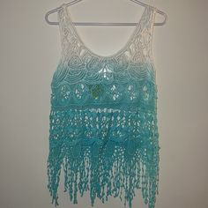 Breeze Ever Small Ombr Crochet Top Sleeveless Ombre Crochet Top, Blue Lace Crochet Top For Summer, Sleeveless Crochet Beach Top For Spring, Beachy Sleeveless Crochet Top For Spring, Sleeveless Beachy Crochet Top For Spring, White Sleeveless Crochet Top For Beachwear, Beachy White Sleeveless Crochet Top, Sleeveless Lace Crochet Top For Beach, Sleeveless Blue Lace Tops