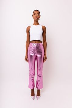 High waist vegan leather trousers in metallic finish. Crafted from super soft premium material with suede finish inside.  Slim fit. Stretchy fabric.  Straight leg silhouette with slight bell-bottoms.  Structured waistband with belt loops and 4 functional pockets.  Exposed button and concealed zip-fly fastening. 45% Polyester, 55% PU Hand wash. Metallic Crease Care: First turn the garment inside out on a flat surface or ironing board. Set your iron to the COOLEST setting (Silk). Place a clean tea Metallic Trousers, Trendy Pants, Leather Trousers, Slim Fit Pants, Independent Designers Fashion, Badger, Bell Bottoms, Fashion Jewellery, Stretchy Fabric