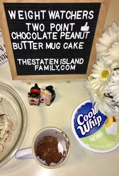 there is a sign that says weight watchers two point chocolate peanut butter mug cake