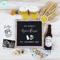 the new baby announcement is displayed with beer and other items